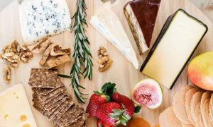 A delightful platter of cheese, fruit, nuts and crackers for your sunshine coast day trips.